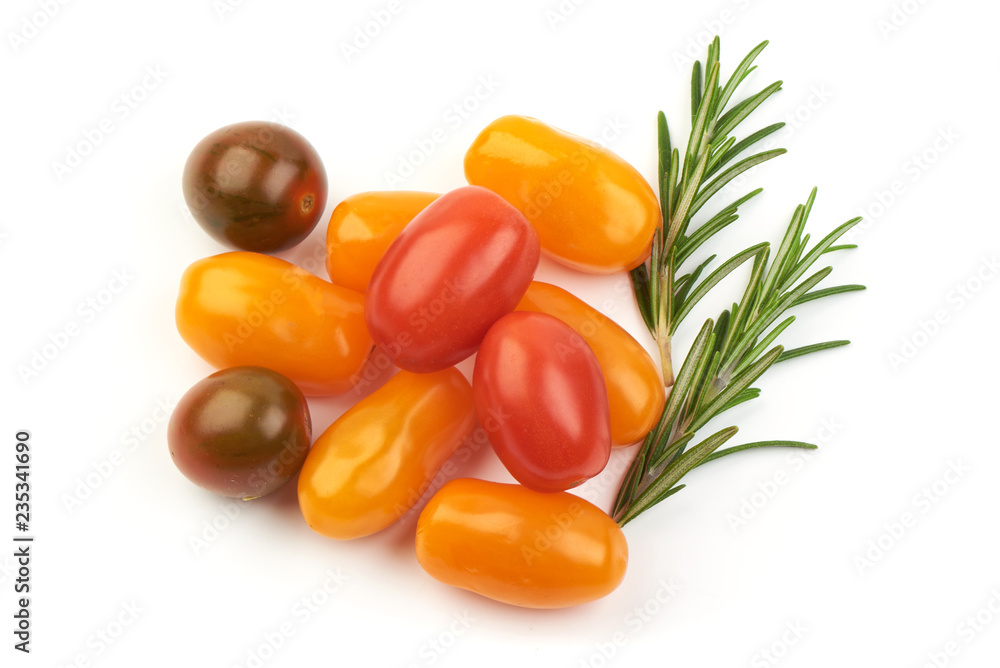 Orange, red and brown cherry Tomatoes, isolated on a white background. Orange, red and brown cherry Tomatoes, isolated on a white background.