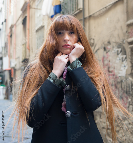 Young girl in  autumn street photography  urban city