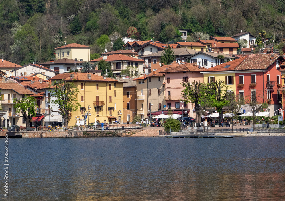 colorful lakefront of a small Italian village. Porto Ceresio, Lugano Lake