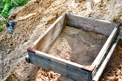 sieve for sifting sand from stones during construction