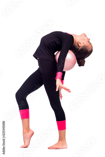 Beautiful teen girl doing rhythmic gymnastics exercises. White background 