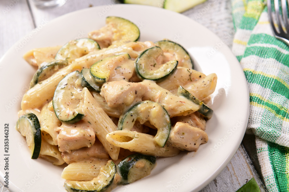 Penne pasta witch chicken and zucchini in cheese sauce Penne pasta witch chicken and zucchini in cheese sauce