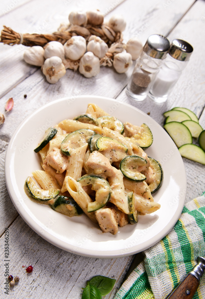 Penne pasta witch chicken and zucchini in cheese sauce Penne pasta witch chicken and zucchini in cheese sauce