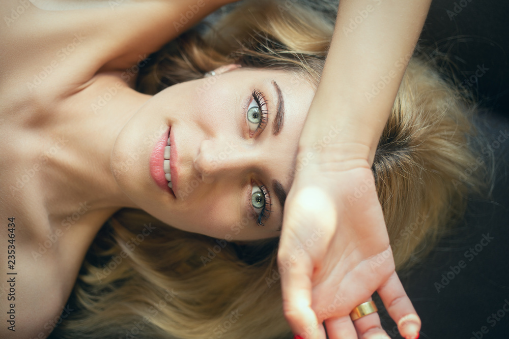 Fototapeta premium young woman lying