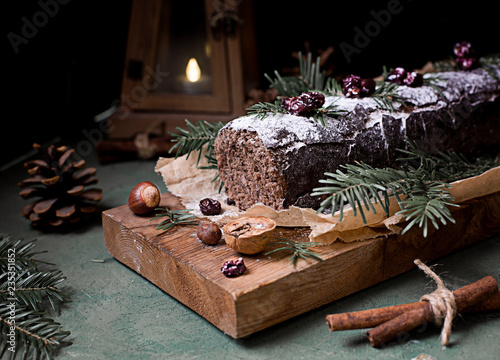 Tableau sur toile Chocolate swiss roll cake roulade with nuts