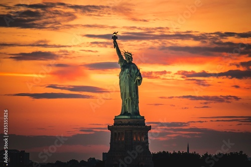 The Statue of Liberty at sunset © Matt