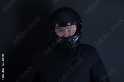 asian man in biker helmet © serikbaib