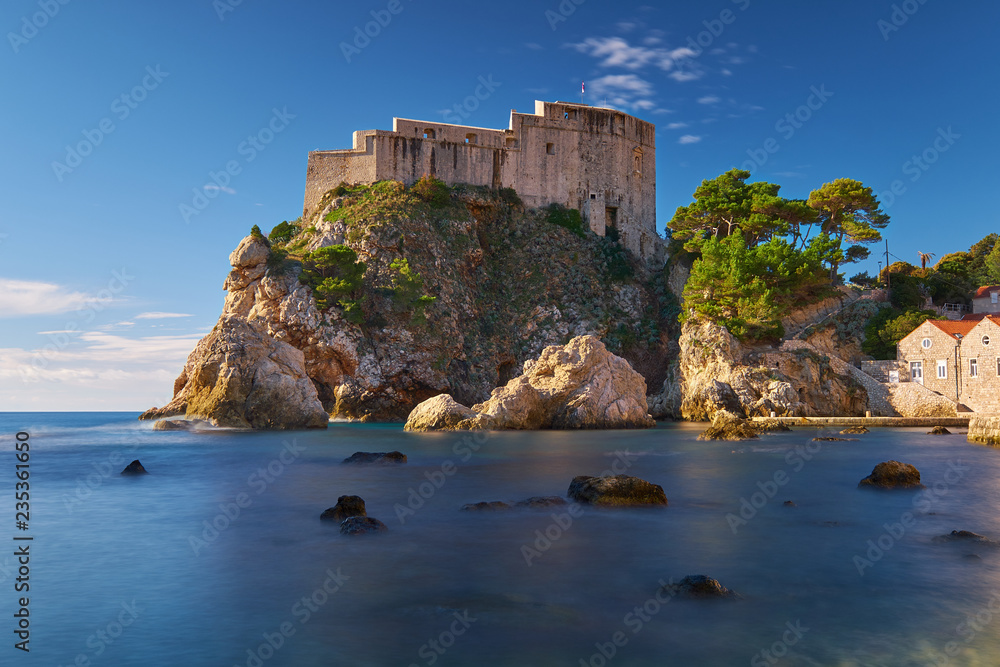 Fort Lovrijenac in Dubrovnic as seen from the beach.  Long exposure to create flat water on a clear bright sunny day. 