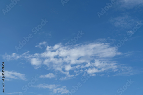 Image of beautiful sunshine day with blue sky, white clouds and copy space pattern, texture, wallpaper and background. 