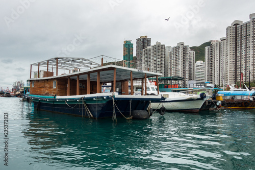 Typical house boats at the Aberdeen floating village, located in Aberdeen harbour, Hong Kong