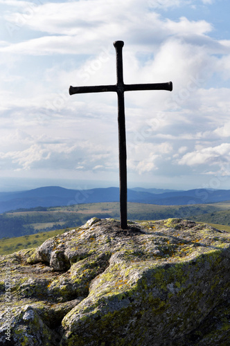 A religious cross on top of a mountain. Saint Jacques de Compostelle pilgrimage