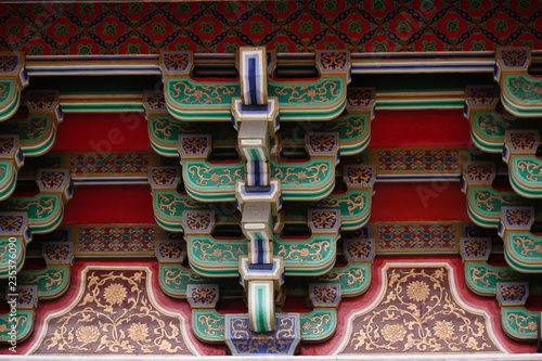 Wooden roof decoration and traditional exterior architecture of a main temple in downtown Taichung, Taiwan, Asia