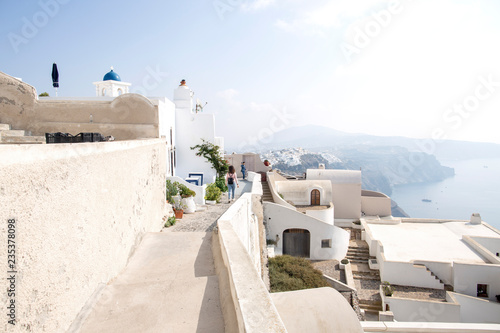 Thira, Santorini - panoramic view. Panoramic view Traditional famous white houses and churches in Thira town on Santorini island in Greece