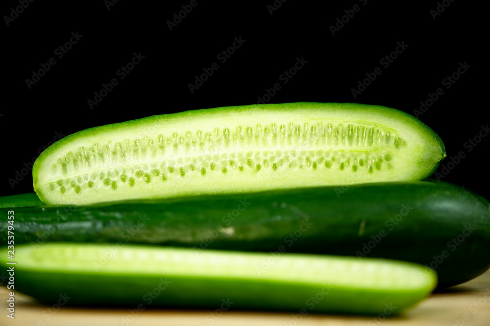 Fresh organic cucumbers on wood Fresh organic cucumbers on wood