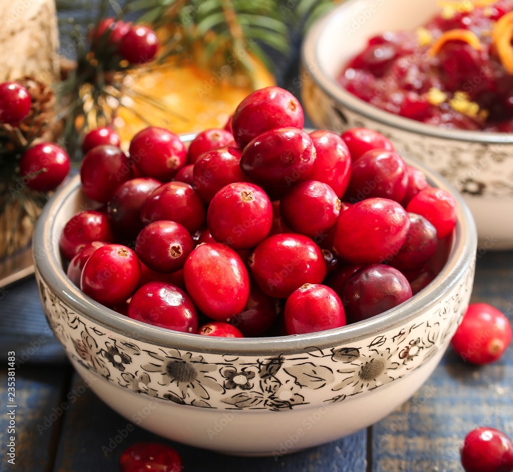 Fresh Cranberries with sauce on side / Xmas thanksgiving background Fresh Cranberries with sauce on side / Xmas thanksgiving background