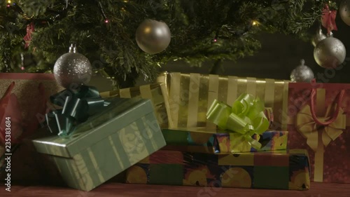 Wrapped presents under Christmas tree
