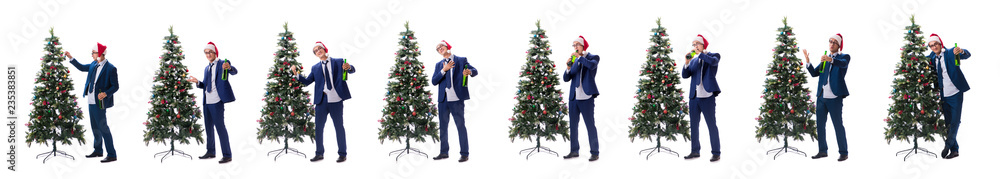 Businessman decorating christmas tree isolated on white Businessman decorating christmas tree isolated on white