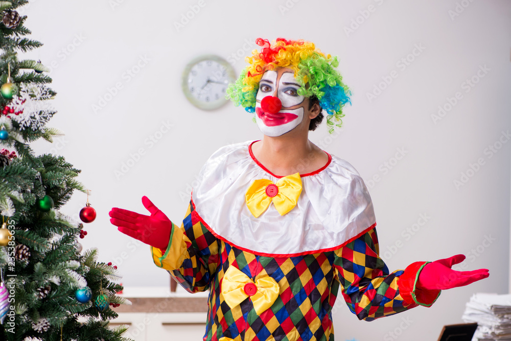 Funny clown in Christmas celebration concept Funny clown in Christmas celebration concept