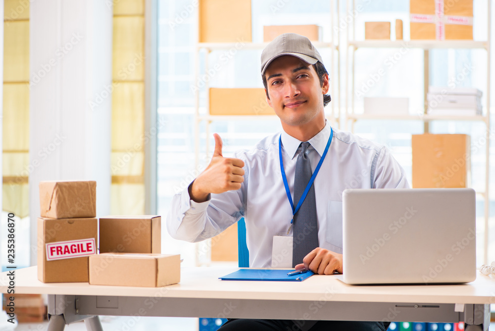 Male employee working in box delivery relocation service Male employee working in box delivery relocation service