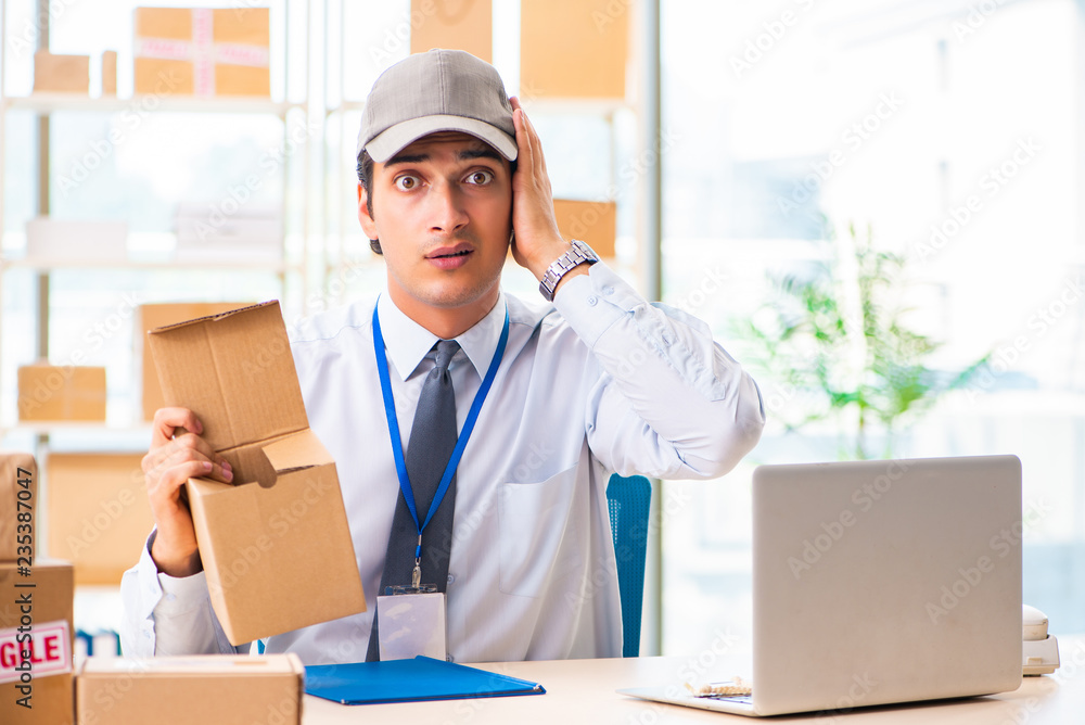 Male employee working in box delivery relocation service Male employee working in box delivery relocation service