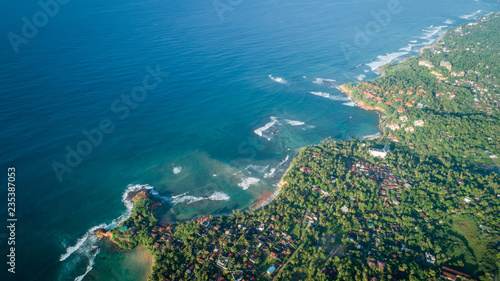 Aerail view of beautiful seascape with fisherman village in sri lanka