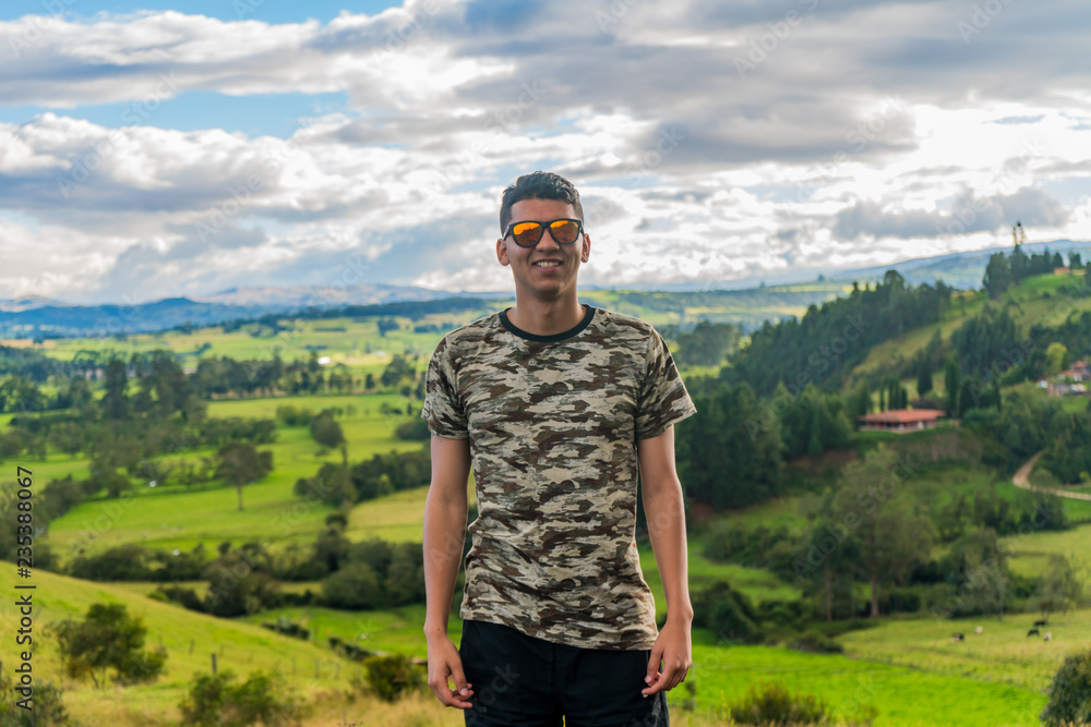 Man with glasses on top of a mountain. Travel, vacation. Man with glasses on top of a mountain. Travel, vacation.