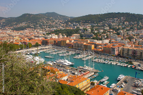 Sailboats, Boats, and Homes on a harbor in Nice, France