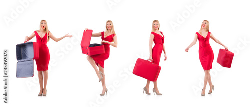 Woman in red dress and travel case isolated on white