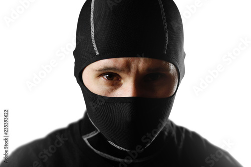 The man in the black Balaclava. Close up. Isolated on white background