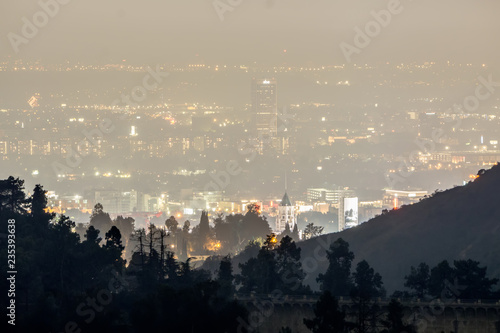 hollywood hills and valley at night near hollywood sign
