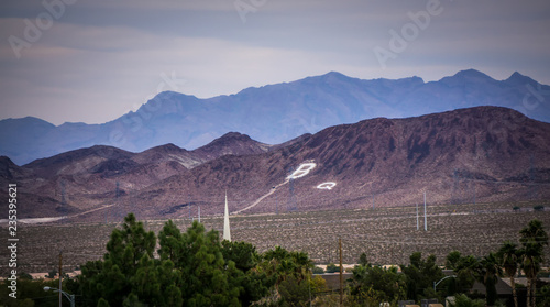Las vegas city surrounded by red rock mountains and valley of fire
