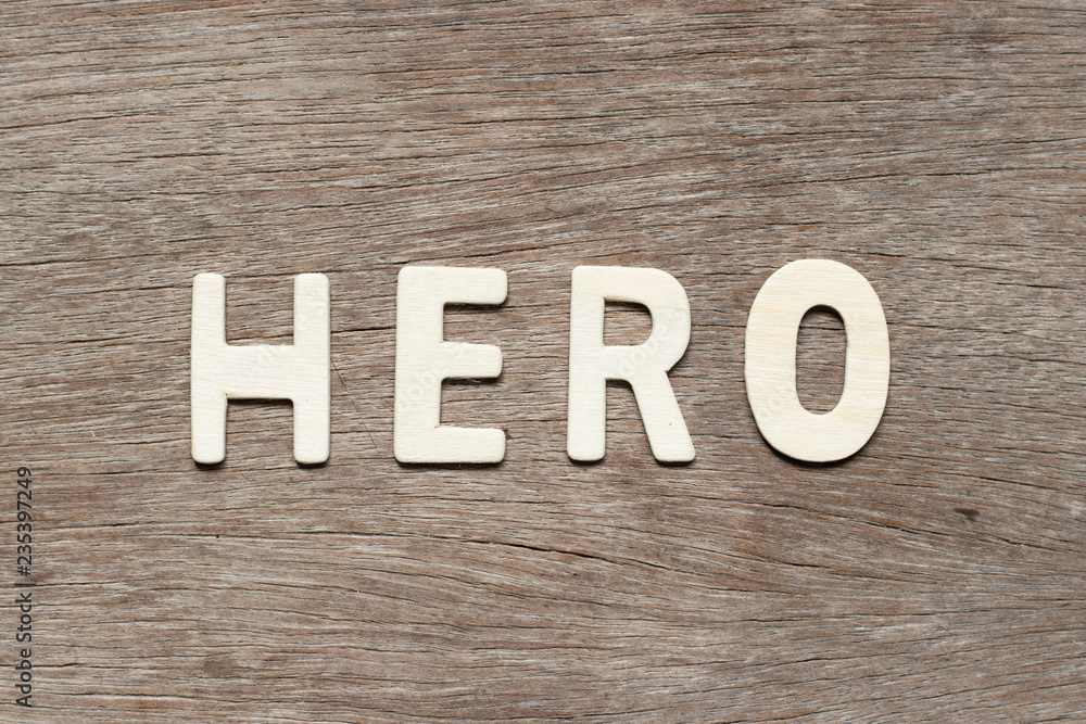 Alphabet letter in word hero on wood background Alphabet letter in word hero on wood background