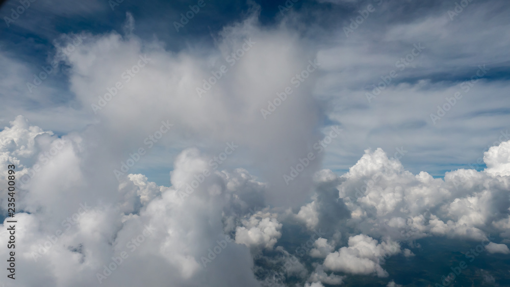 Big clouds and blue sky in the nature look from plane Big clouds and blue sky in the nature look from plane