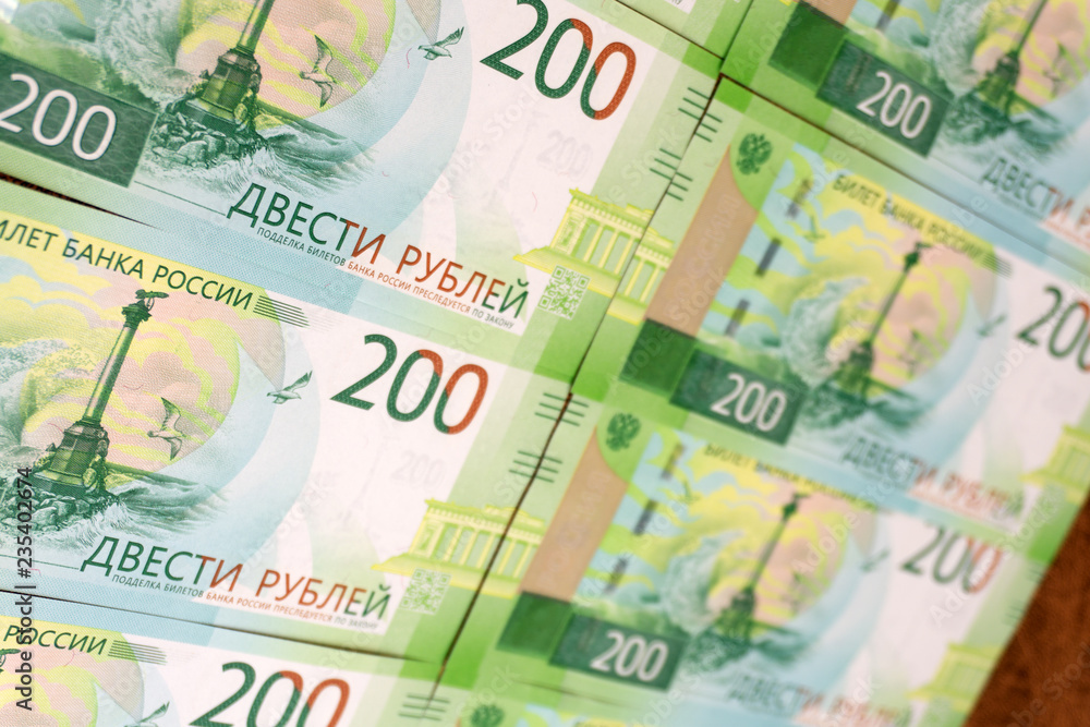 Christmas tree made of money, Russian banknotes of 5,000 and 200 rubles on a white background, new year . Christmas tree made of money, Russian banknotes of 5,000 and 200 rubles on a white background, new year .