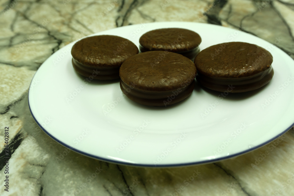 cookies with chocolate and chocolate coffee eating . cookies with chocolate and chocolate coffee eating .