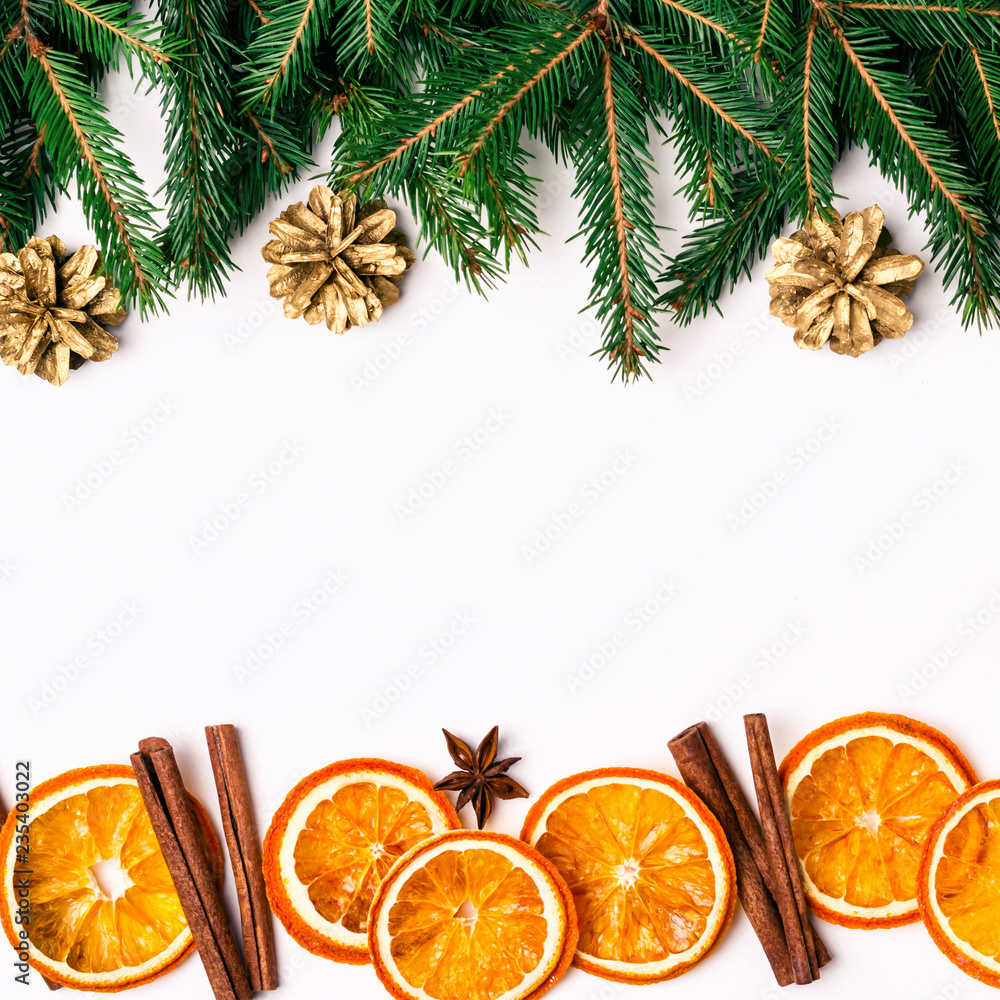 Christmas Nature Border of Fir Branches, Dry Oranges Slices and cinnamon sticks Christmas Nature Border of Fir Branches, Dry Oranges Slices and cinnamon sticks