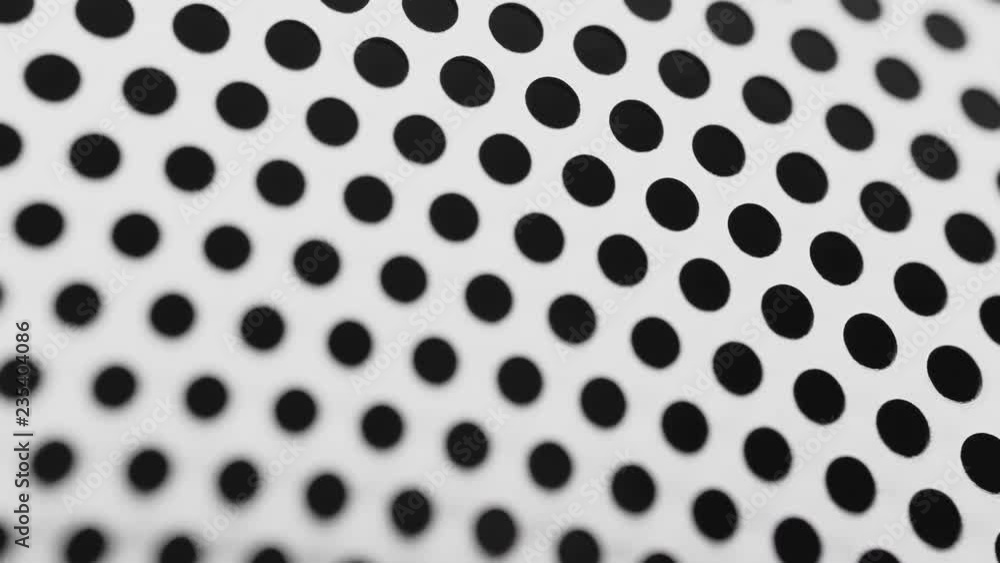 Rotated perforated steel surface background.
Rotated perforated steel surface background.