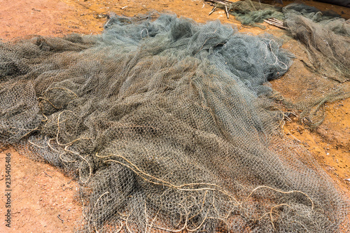 Photography Fishing Net laying on the Ground in Kampong Phluk, Cambodia