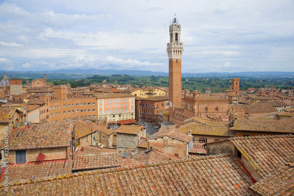 Over the roofs of Siena on a September cloudy day. Italy