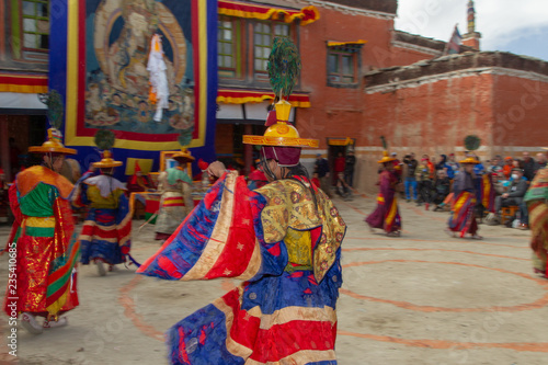 LO-MANTHANG, NEPAL - MAY 12, 2018 : Unidentified monk in mask perform a religious masked mystery dance of Tibetan Buddhism during the Tiji festival in monastery at Lo-Manthang, Nepal.