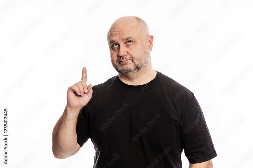 Naklejka premium Adult bald man, forefinger in, attention
