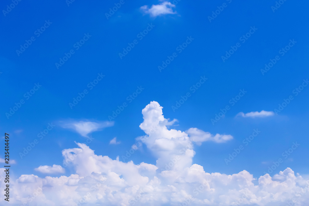 Vast cloud groups patterns on bright blue sky background Vast cloud groups patterns on bright blue sky background