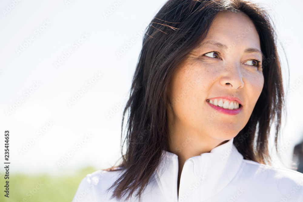 Portrait of a beautiful Asian woman smiling. Portrait of a beautiful Asian woman smiling.