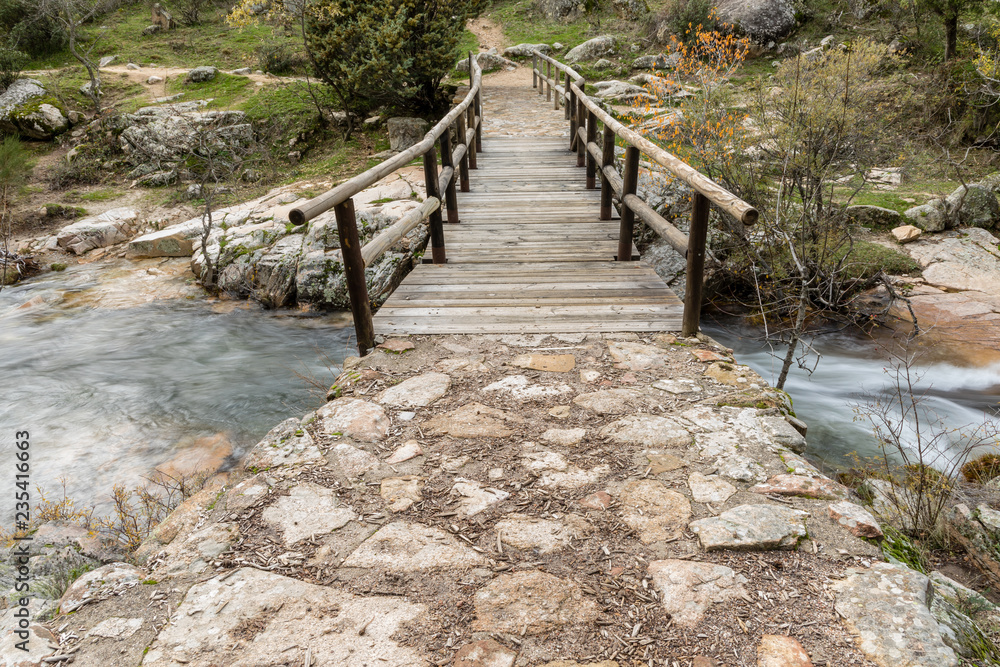 Fototapeta premium Water torrent of the Manzanares river in the Pedriza area of Madrid