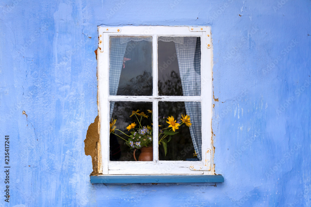A small window with an idyllic still life
