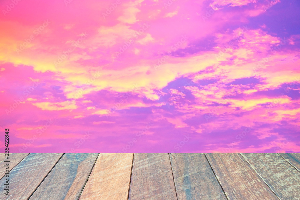 empty wood desk colorful sky twilight sky after sunset with clouds for background .Blank space for text and images. empty wood desk colorful sky twilight sky after sunset with clouds for background .Blank space for text and images.