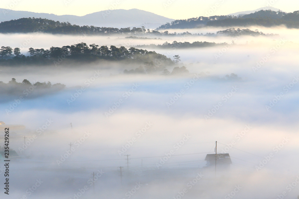 Misty mountain layer at dawn