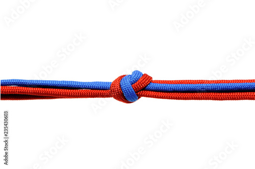 Knot on a cord on a white background .