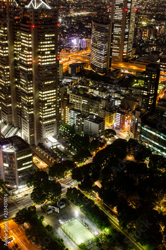 Photography Skyscrapers and streets of the city of Tokyo, downtown, lighted by night on an a