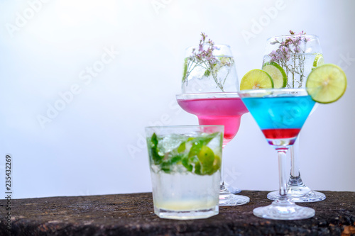 Refreshing cocktail selection on white background